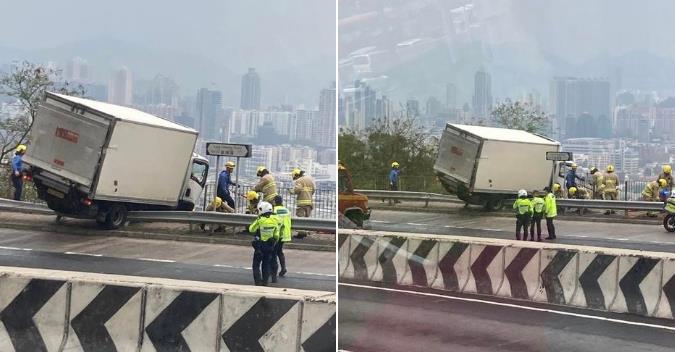 龍翔道貨車疑失控撞欄險跌落山坡 司機乘客送院